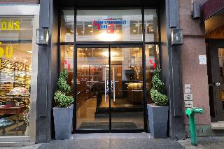 Americana Inn logo